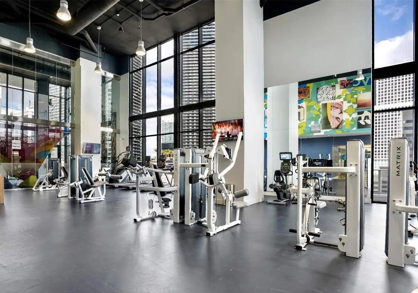 Modern gym interior with large windows at 1010 Brickell, Miami.