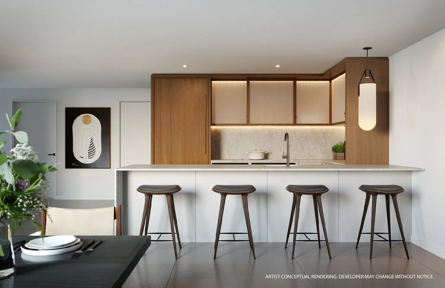 Contemporary kitchen with island and stools at 2200 Brickell Residences.
