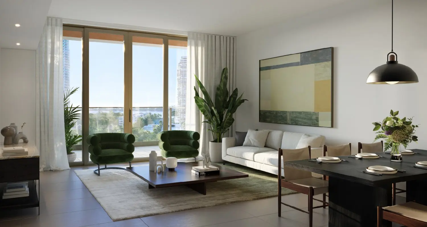 Contemporary living area with large windows at 2200 Brickell Residences in Miami.