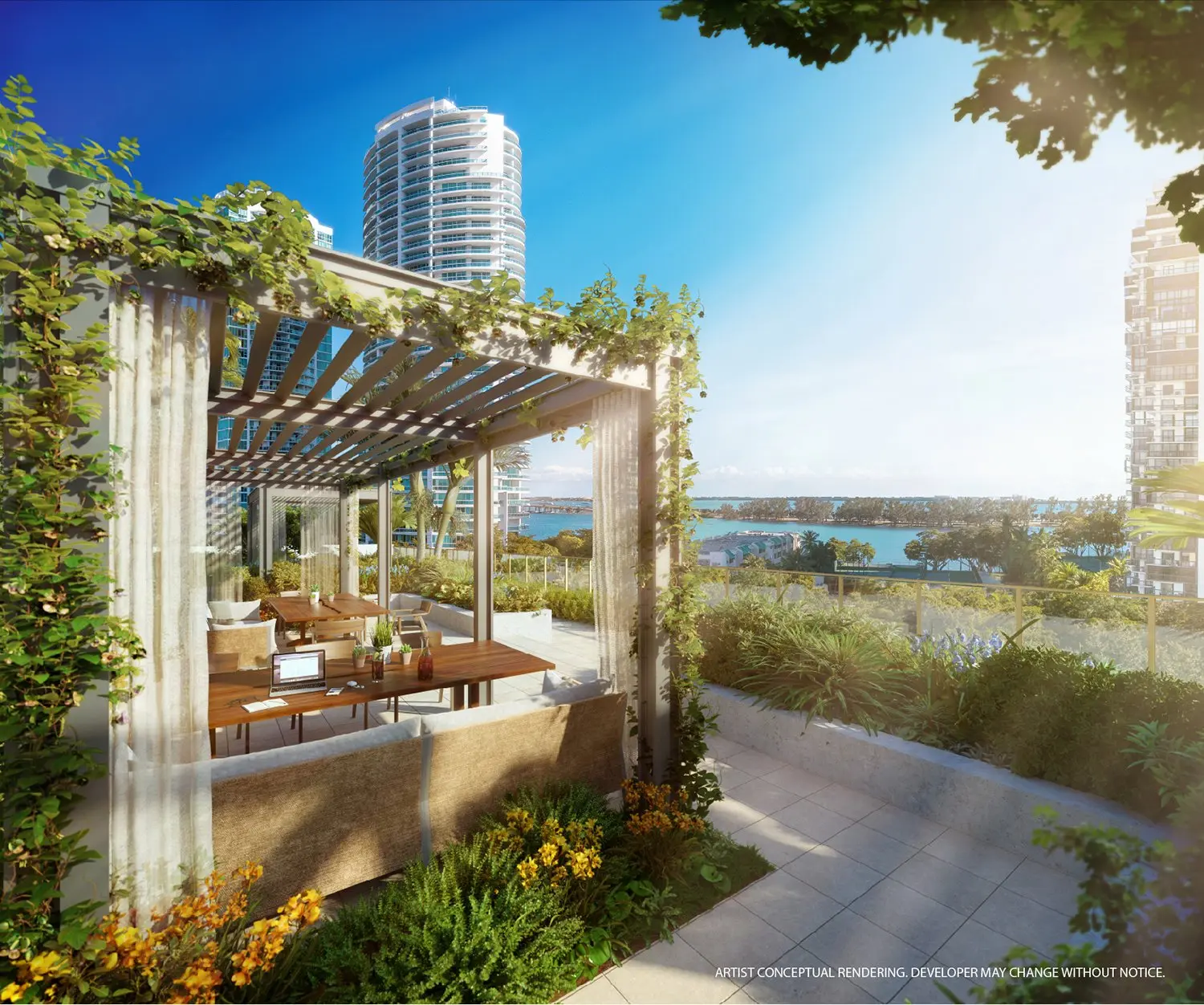Elegant rooftop terrace at 2200 Brickell Residences overlooking Miami waters.