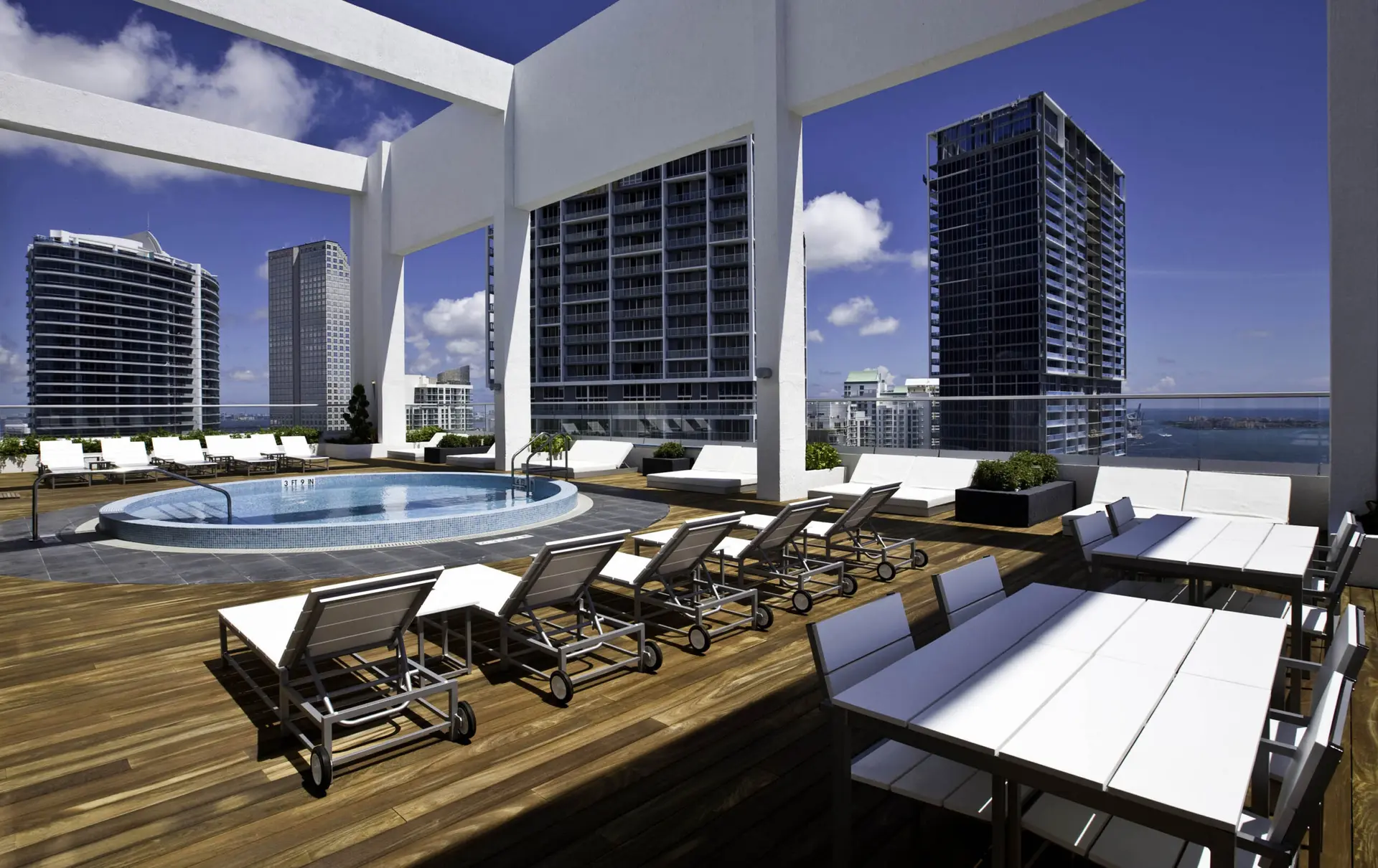 500 Brickell West rooftop pool and lounge area with Miami skyline.