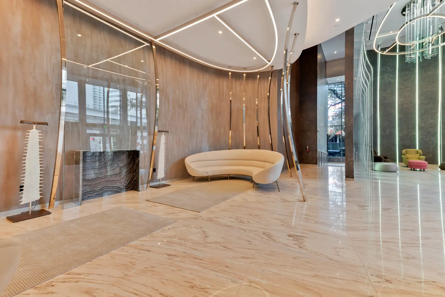 Elegant lobby at Brickell Flatiron featuring modern design and sleek furnishings.