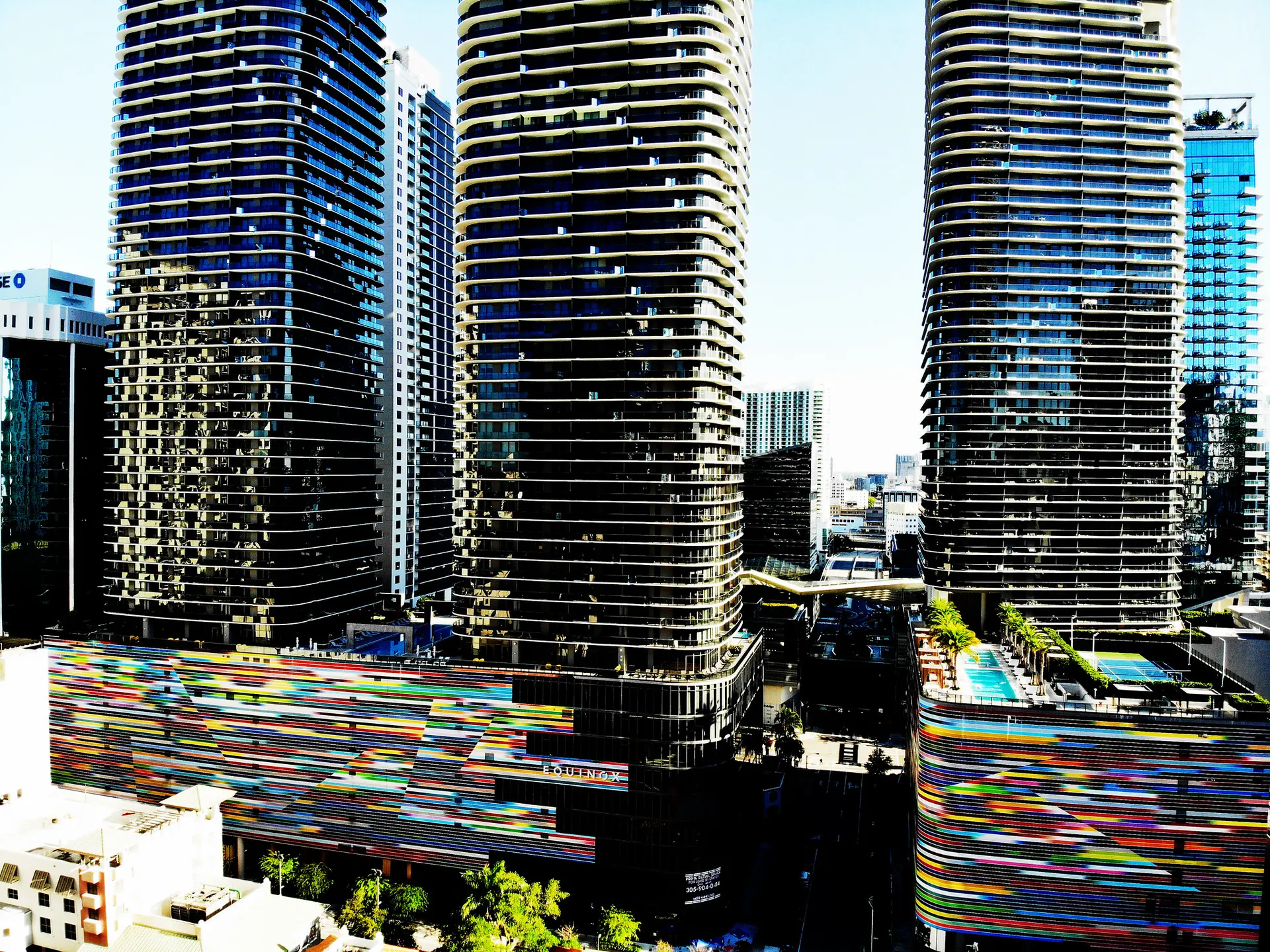 Skyline featuring Brickell Heights East towers and colorful murals in Miami.