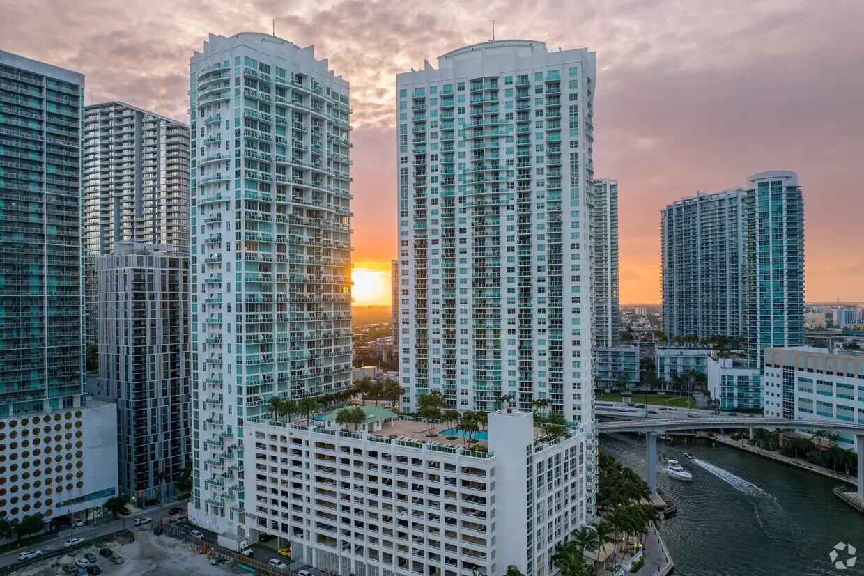 Brickell on the River North with a Miami sunset backdrop.
