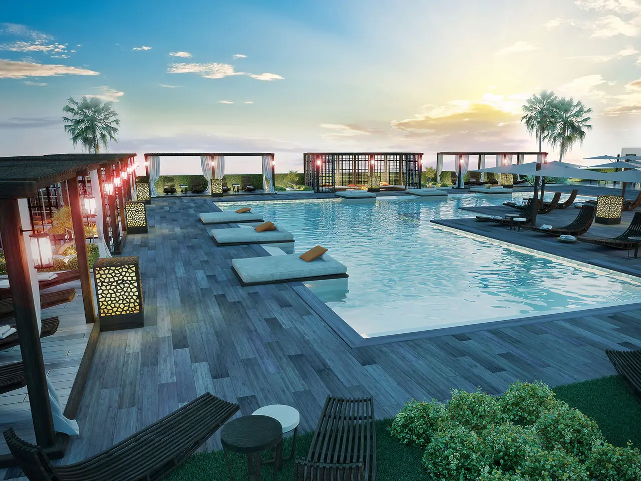 Brickell Ten luxury pool area with lounge chairs and palm trees at sunset.