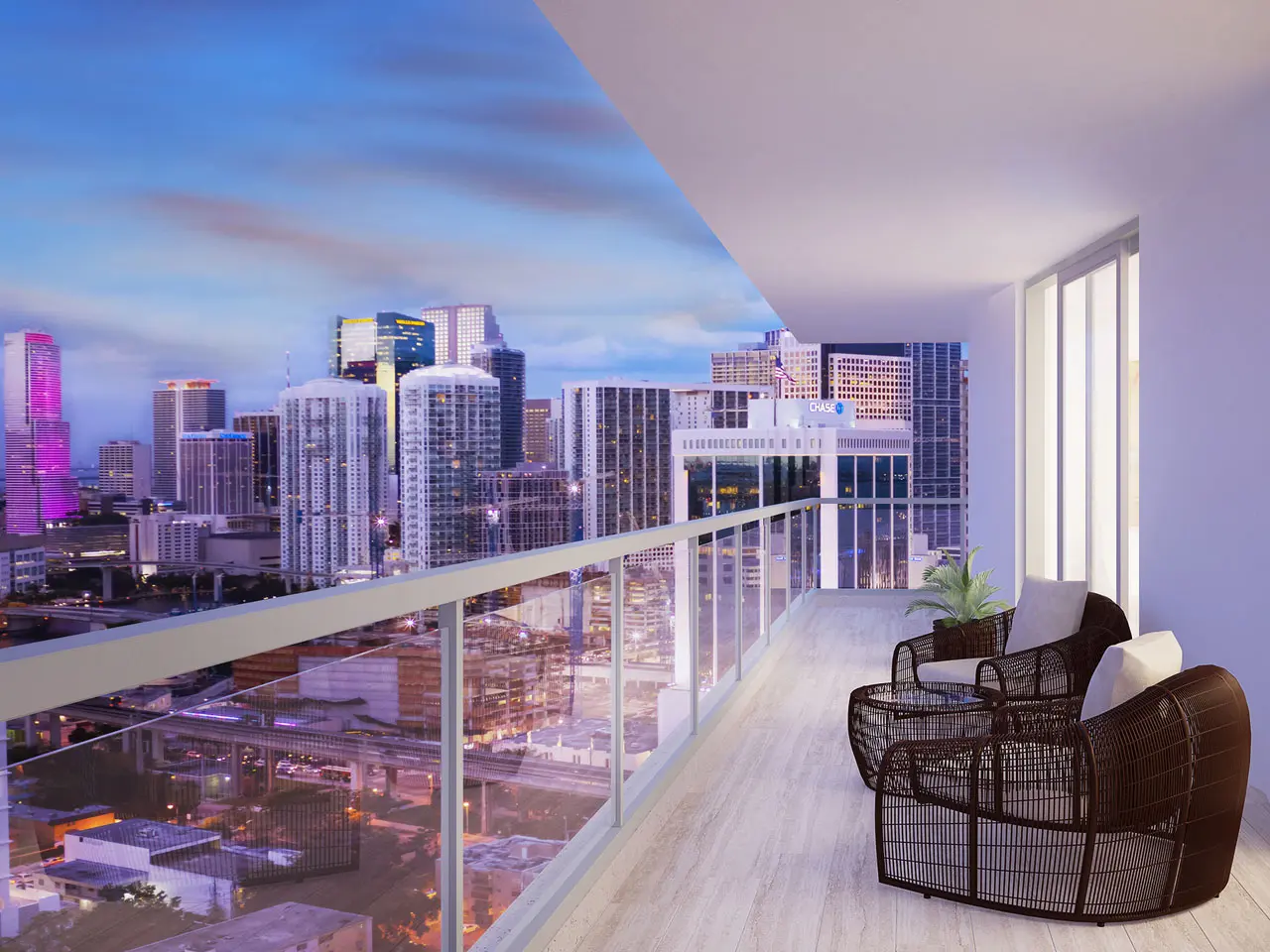 Balcony view from Brickell Ten overlooking Miami's skyline.