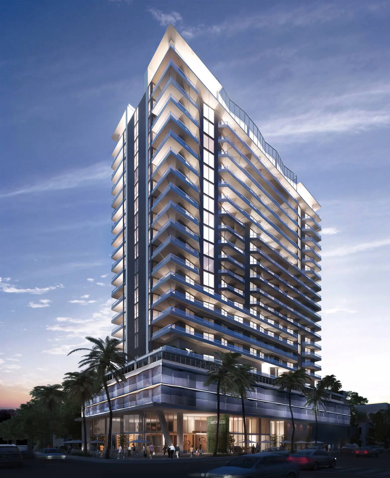 Brickell Ten luxury high-rise illuminated against a Miami evening sky.