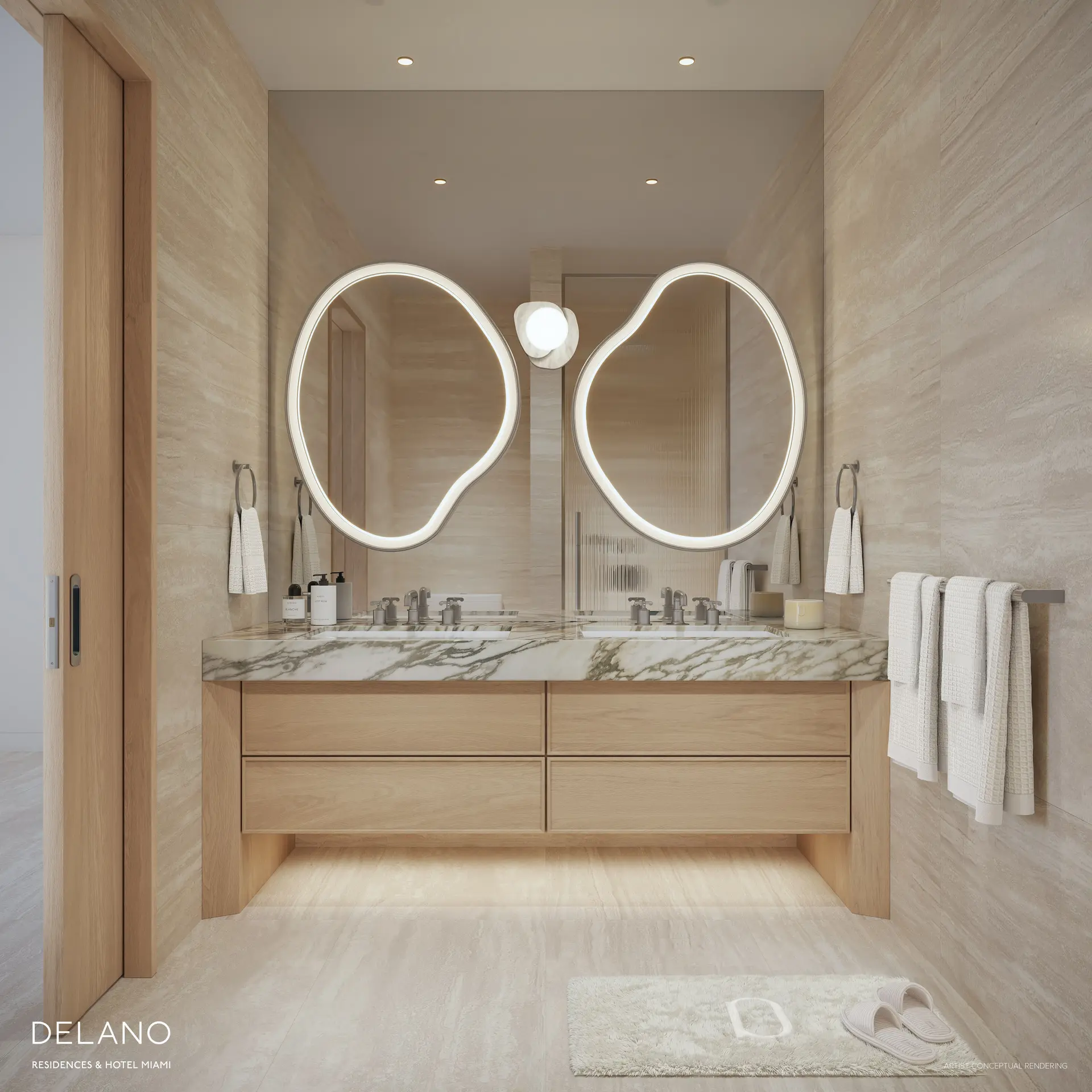 Elegant bathroom with marble counter and custom mirrors at Delano Residences & Hotel Miami.