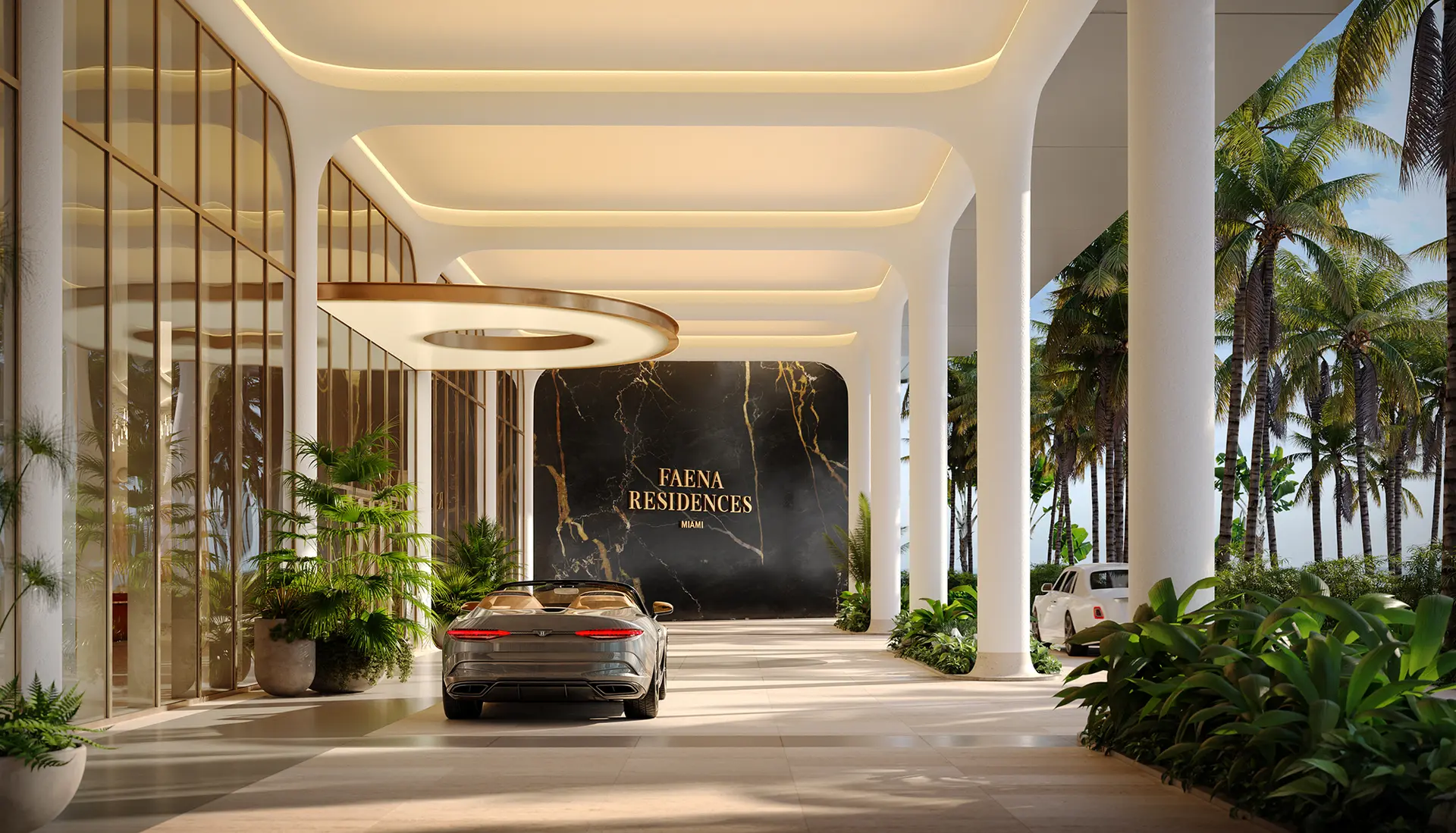 Elegant entrance driveway of Faena Residences Miami with modern design and lush greenery.