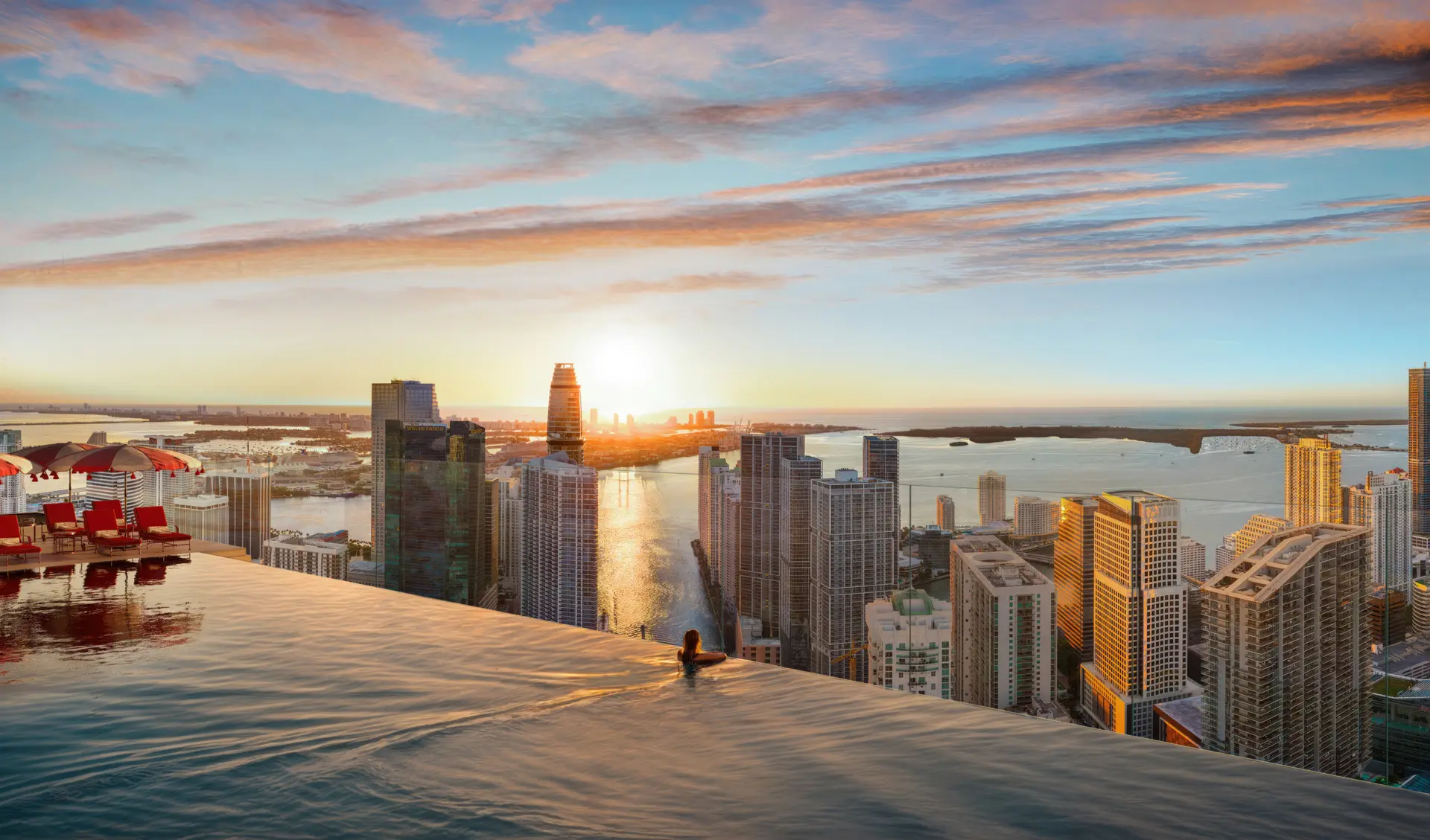 Sunset view from infinity pool at Faena Residences Miami overlooking the cityscape