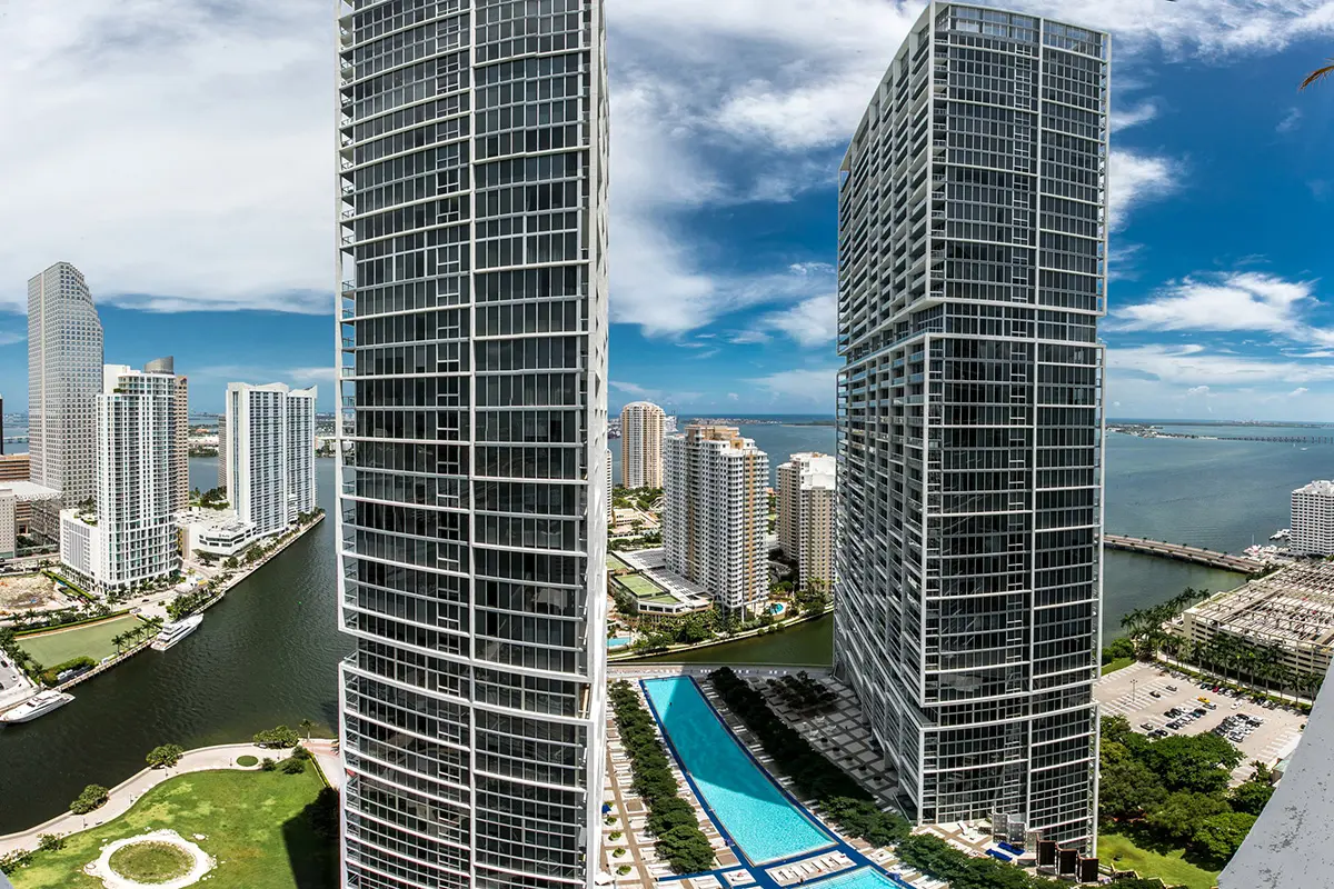 Icon Brickell I towers in Miami with a pool and waterfront view.