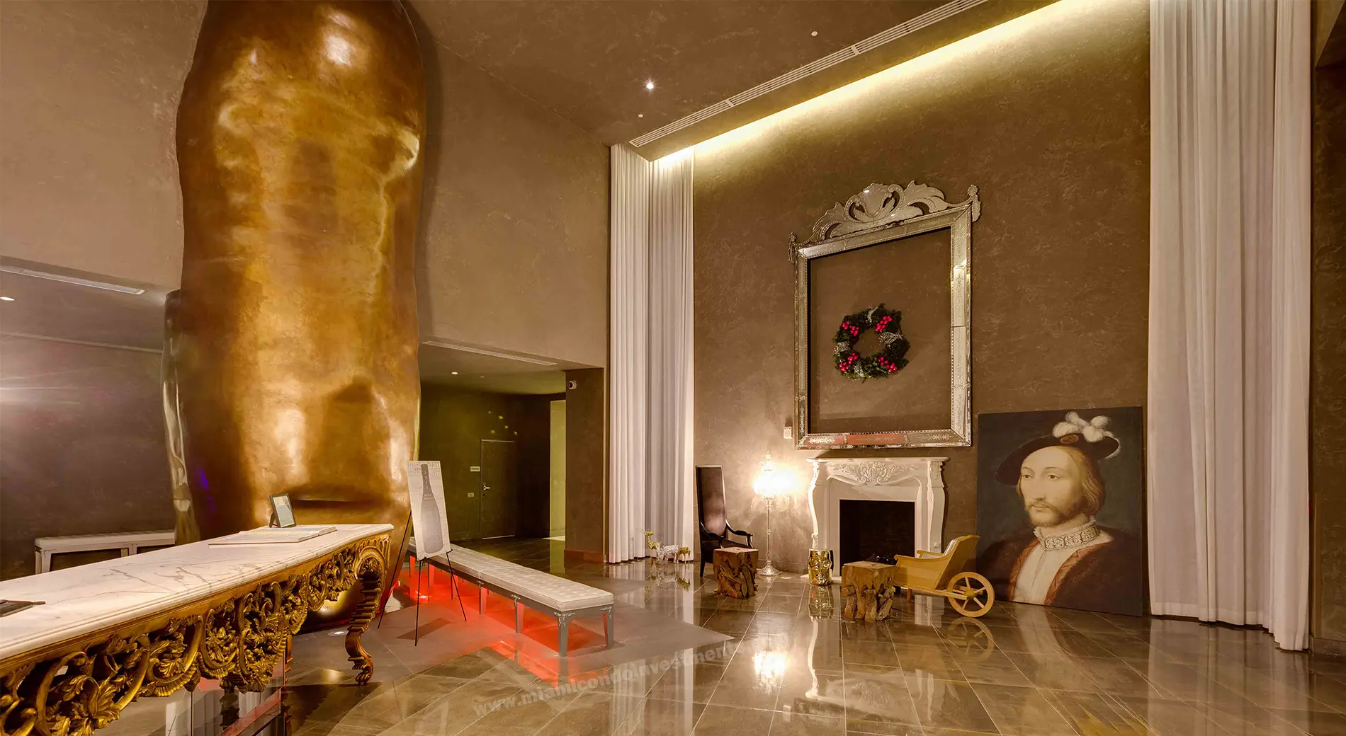 Icon Brickell II lobby featuring a grand sculpture and ornate decor.