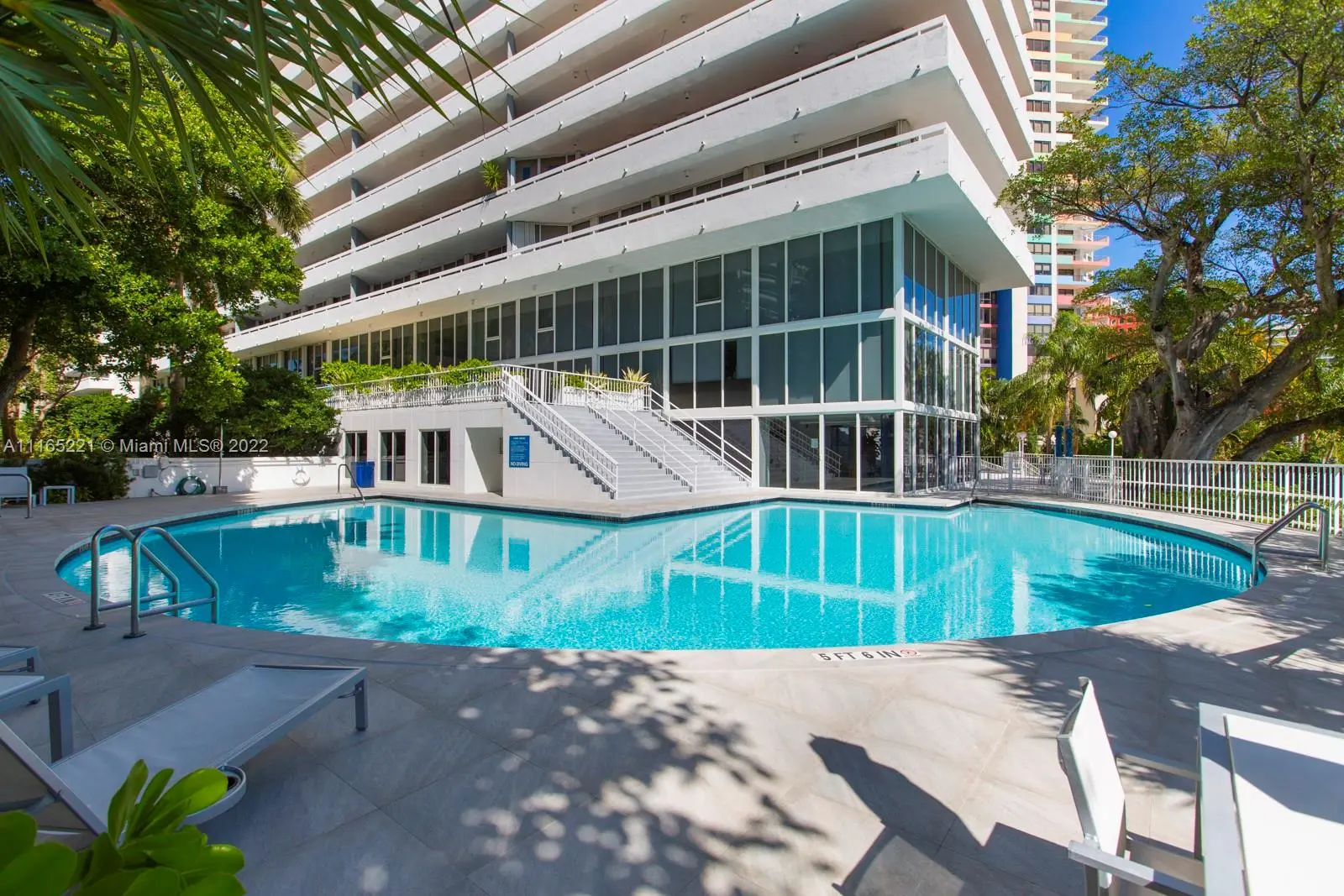 View of the pool area and modern architecture at Imperial at Brickell in Miami.