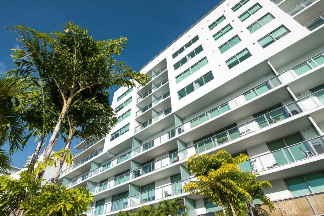 Modern building exterior with glass balconies at Le Parc at Brickell.