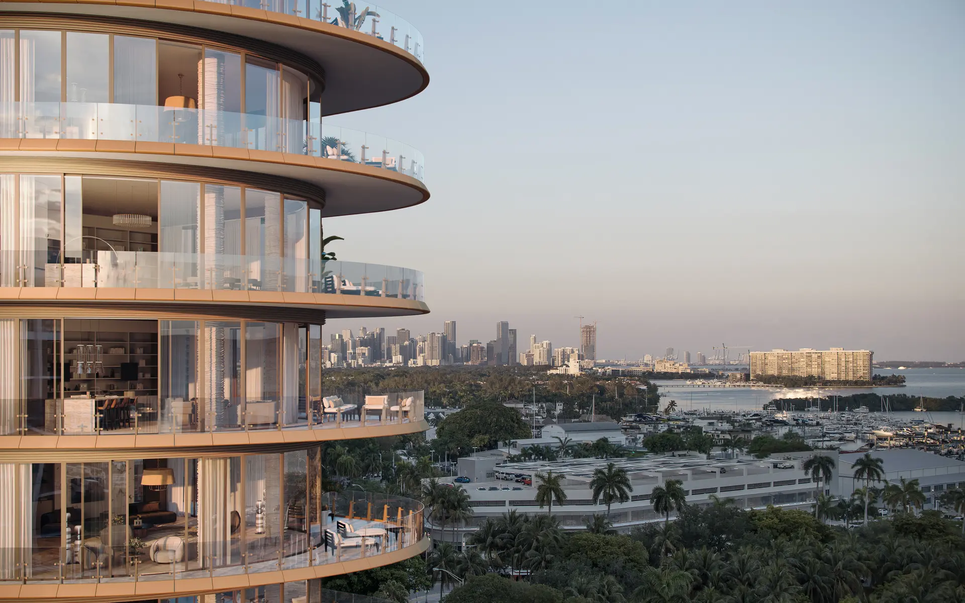 Miami luxury condo balconies overlooking city skyline and waterfront.