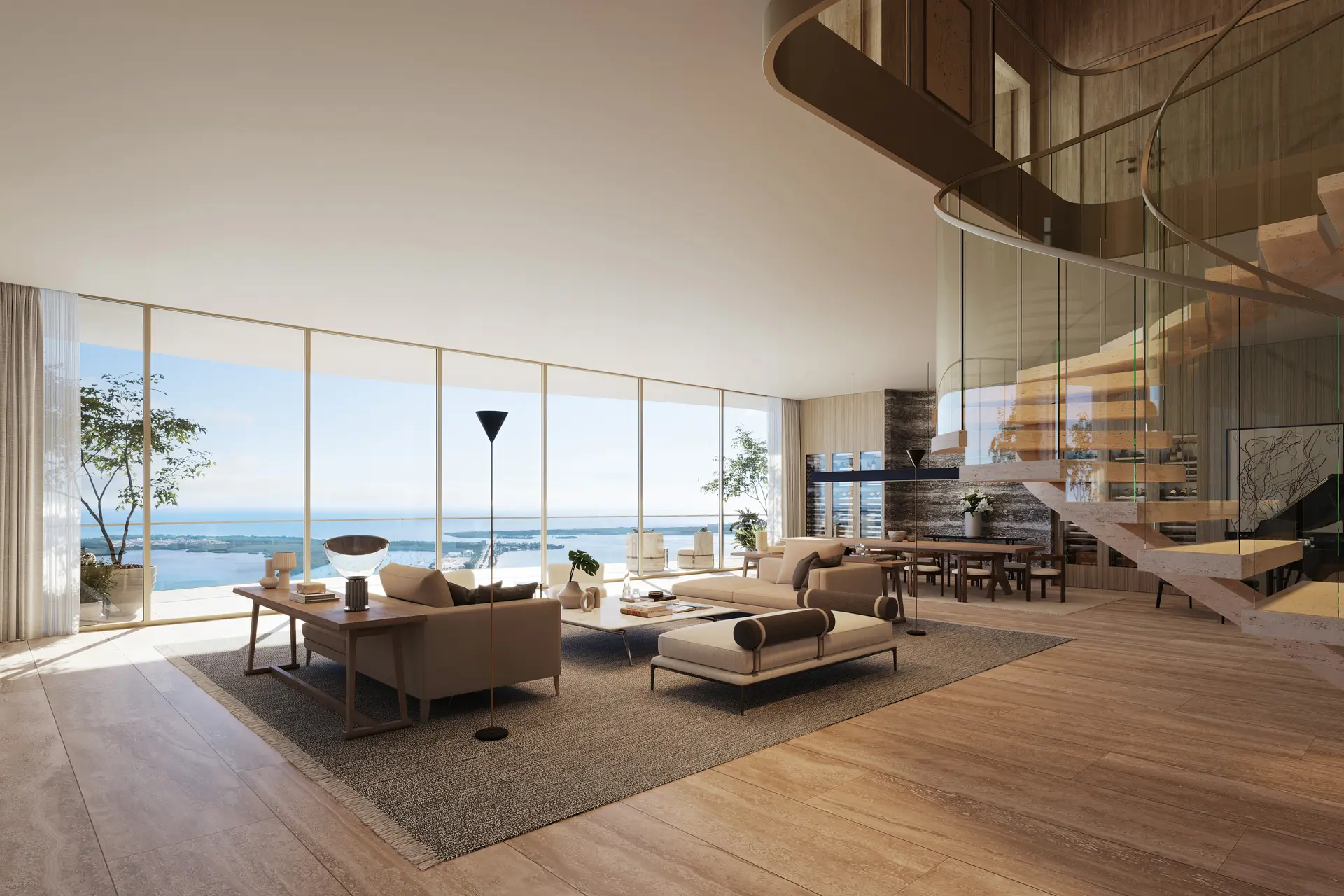Spacious Miami luxury living room with ocean view and modern staircase.
