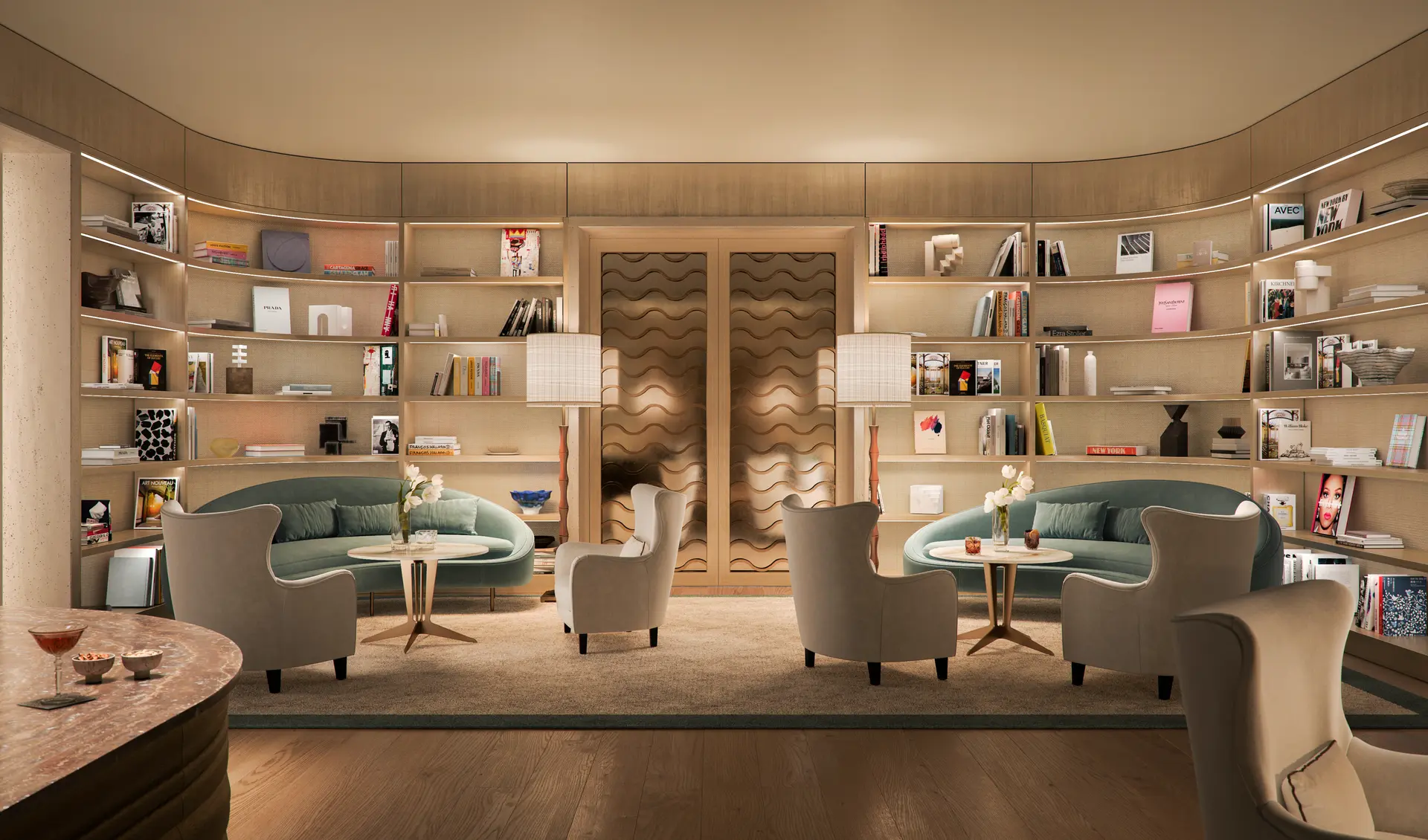 Elegant lounge with plush seating and bookshelves in a Miami luxury project.