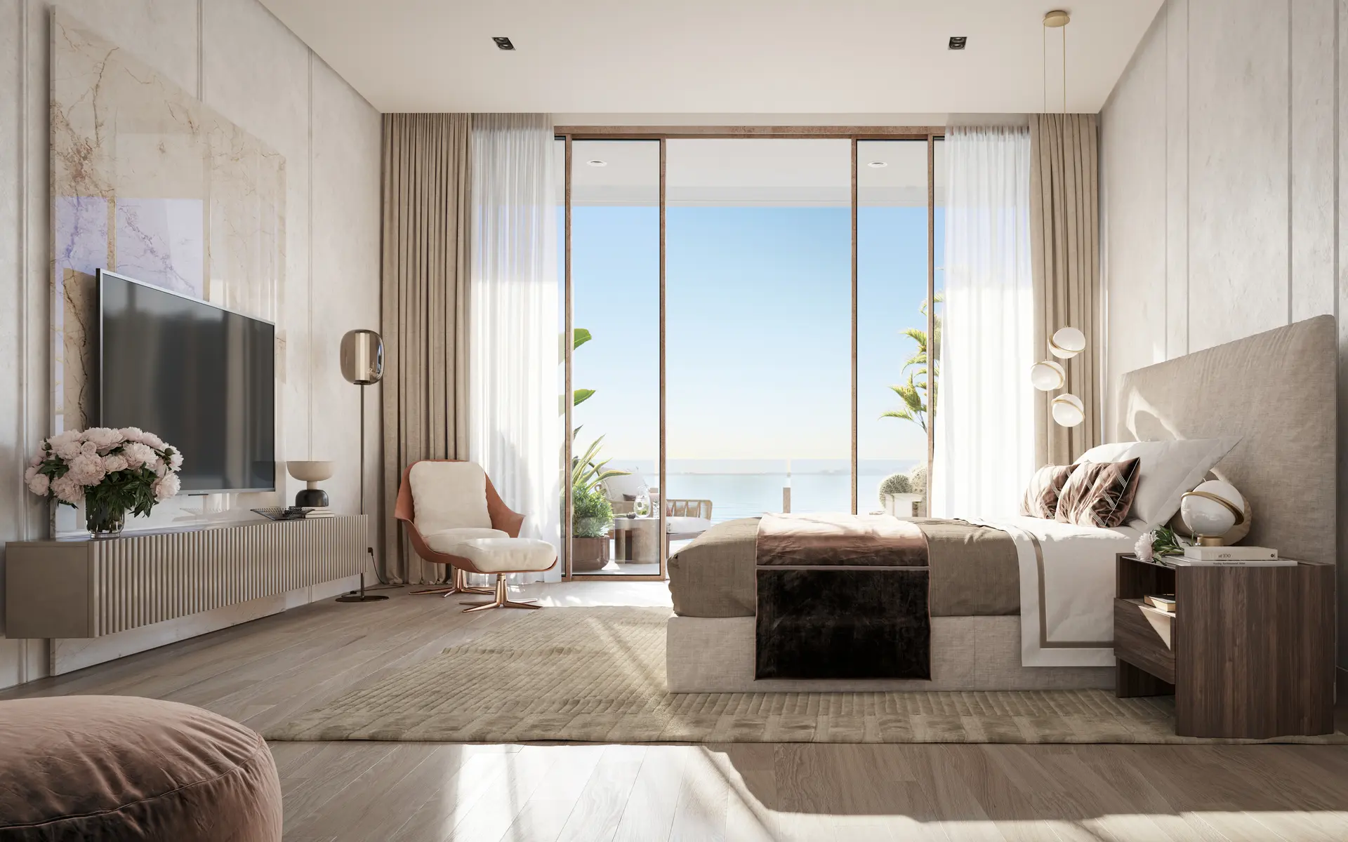Miami Luxury Real Estate spacious bedroom with floor-to-ceiling windows overlooking ocean