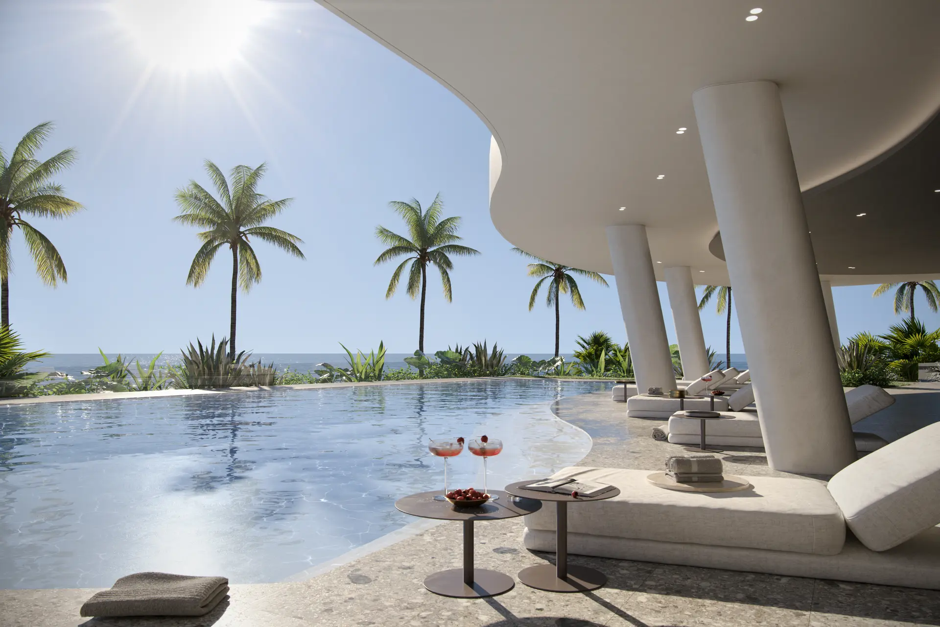 Miami luxury real estate project featuring an ocean-view infinity pool and palm trees
