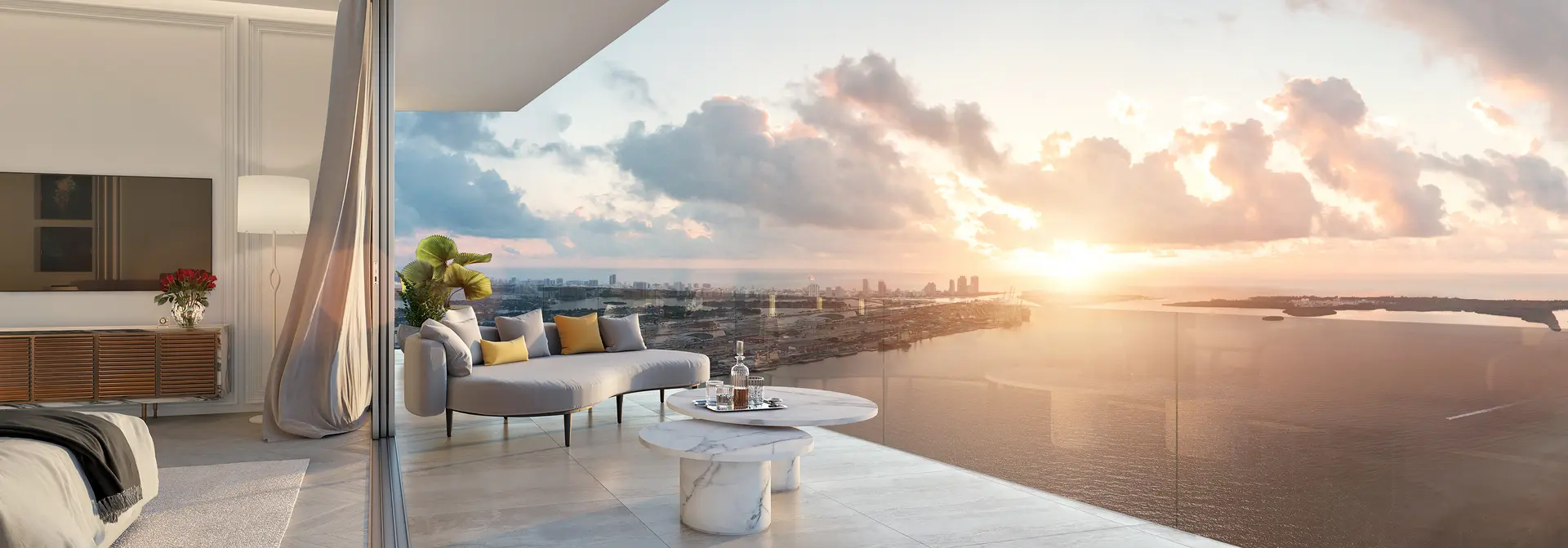 Miami luxury real estate project's balcony with ocean sunset view.