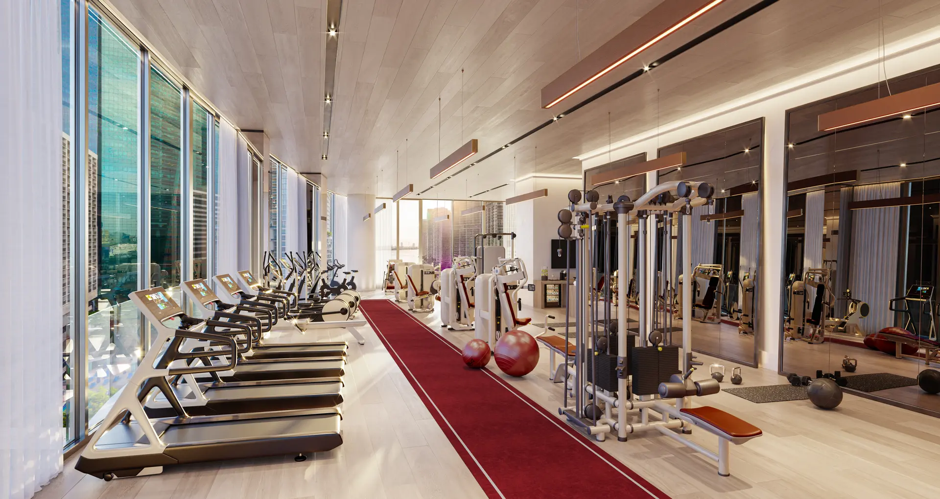 The Project Name features a spacious gym with floor-to-ceiling windows and modern equipment in Miami.
