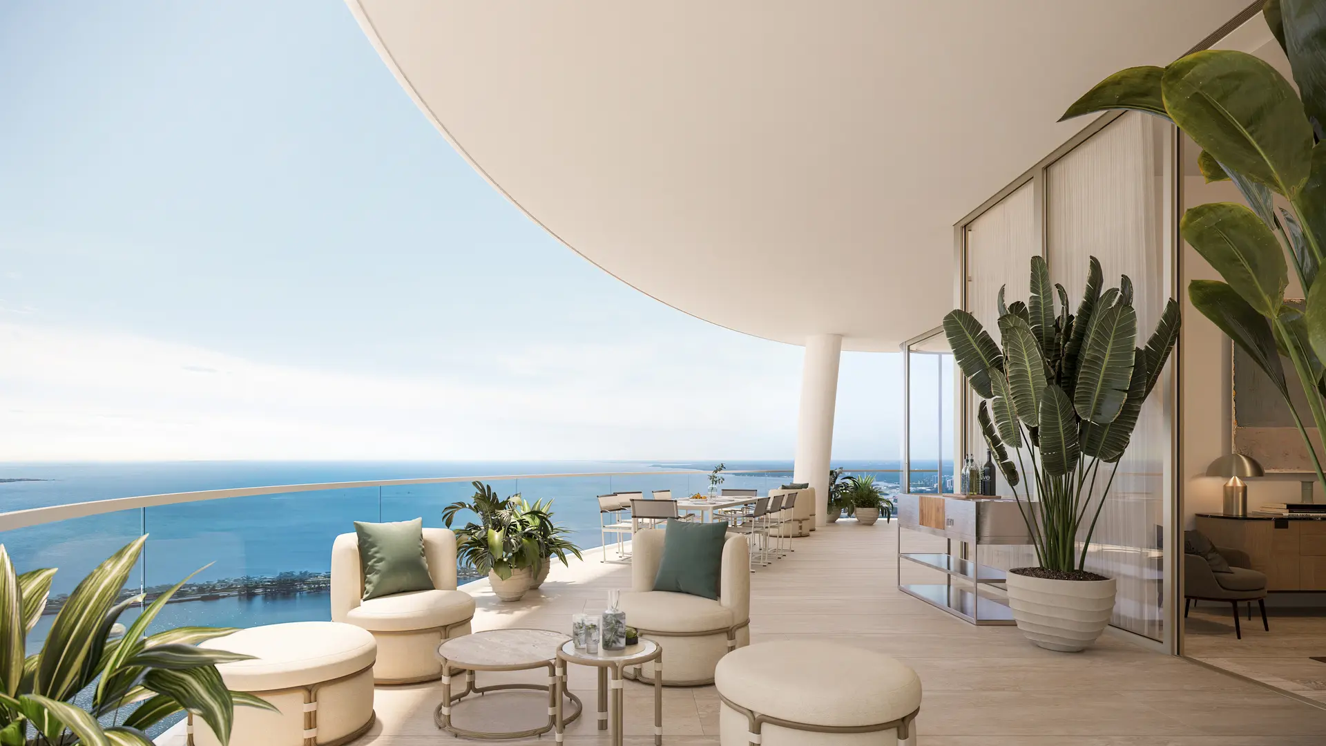 Oceanfront balcony view from the Project Name in Miami with modern seating.