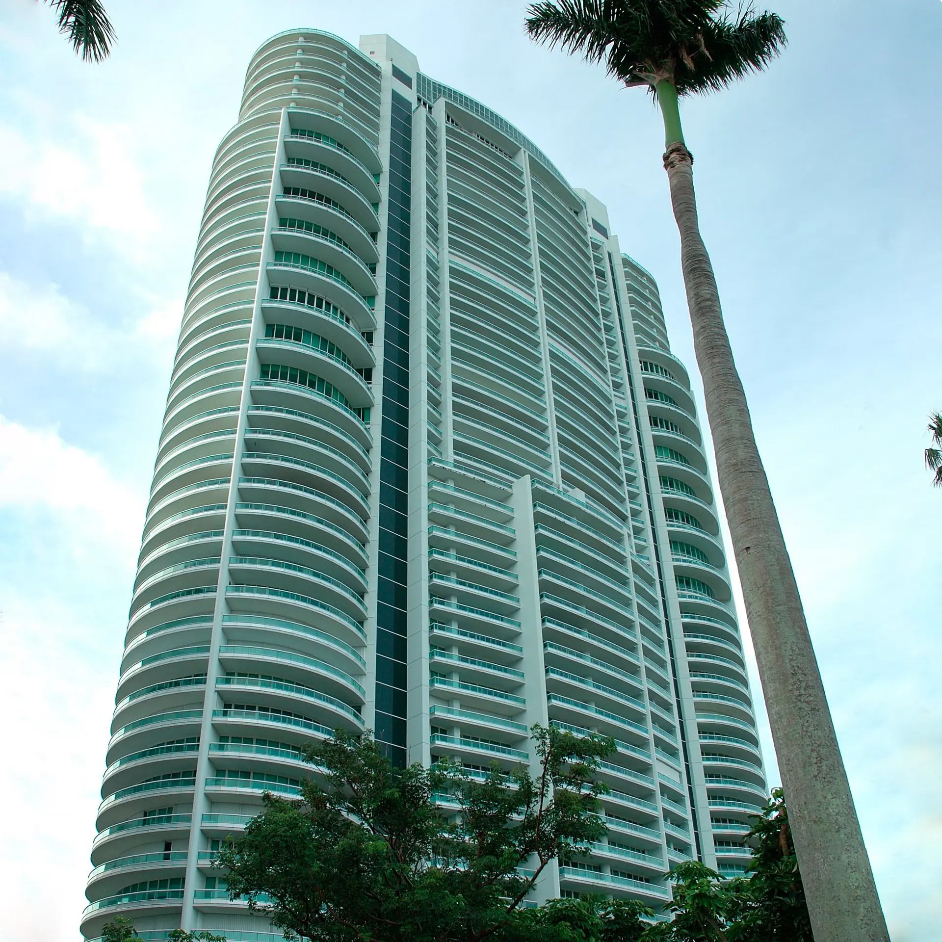 Santa Maria luxury condo tower with curved balconies in Miami.