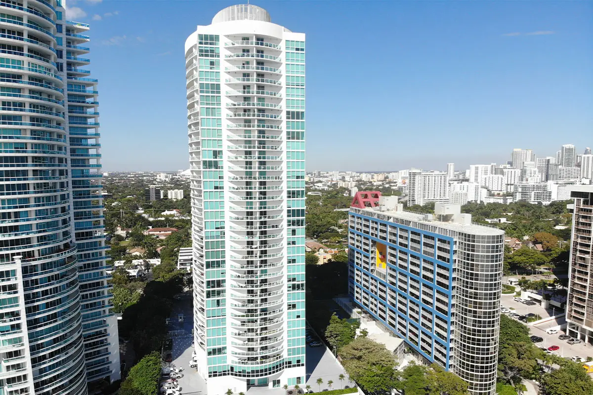 Skyline on Brickell high-rise tower in Miami with adjacent buildings.