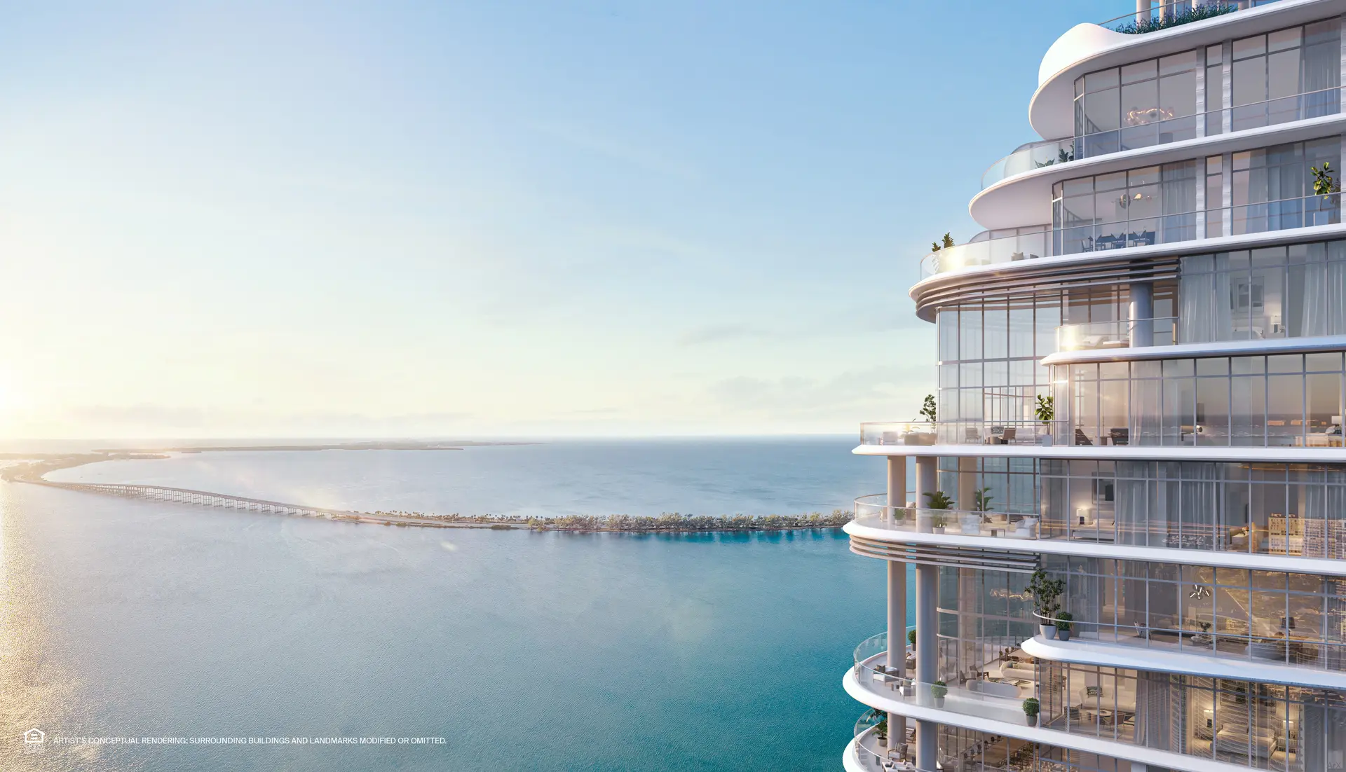 Curved glass balconies of St Regis Brickell overlooking the ocean in Miami.