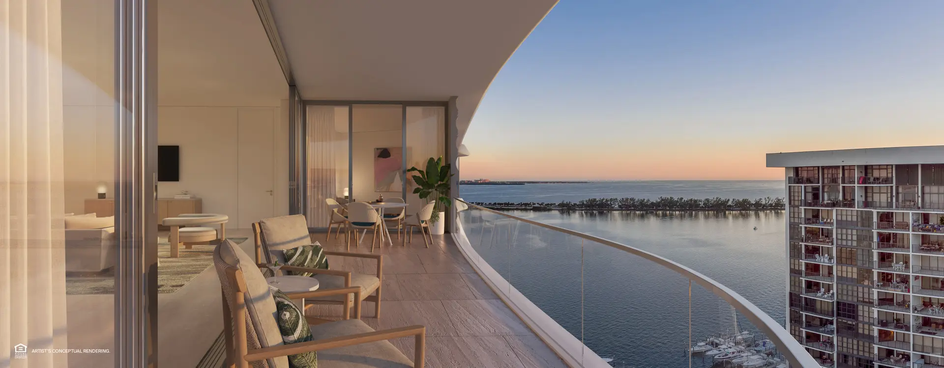 Sunset ocean view from a luxurious St Regis Brickell balcony in Miami.
