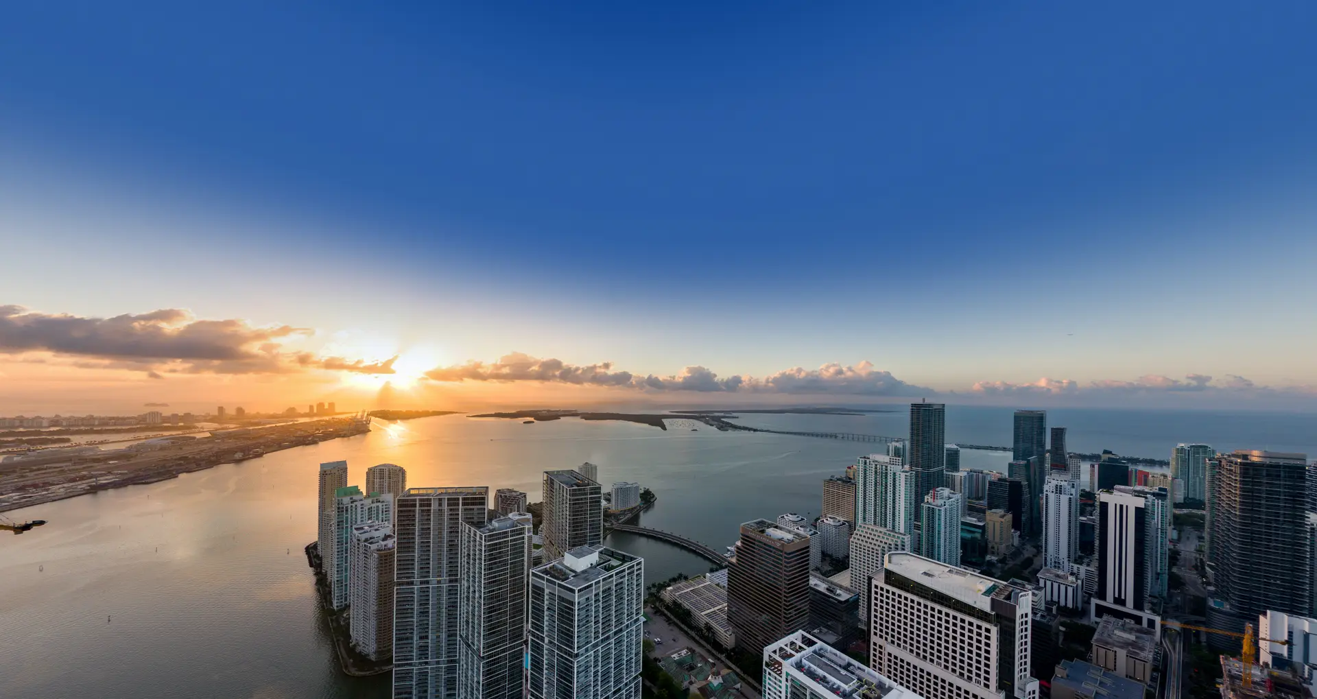 Stunning sunrise over Miami's skyline showcasing modern high-rises.