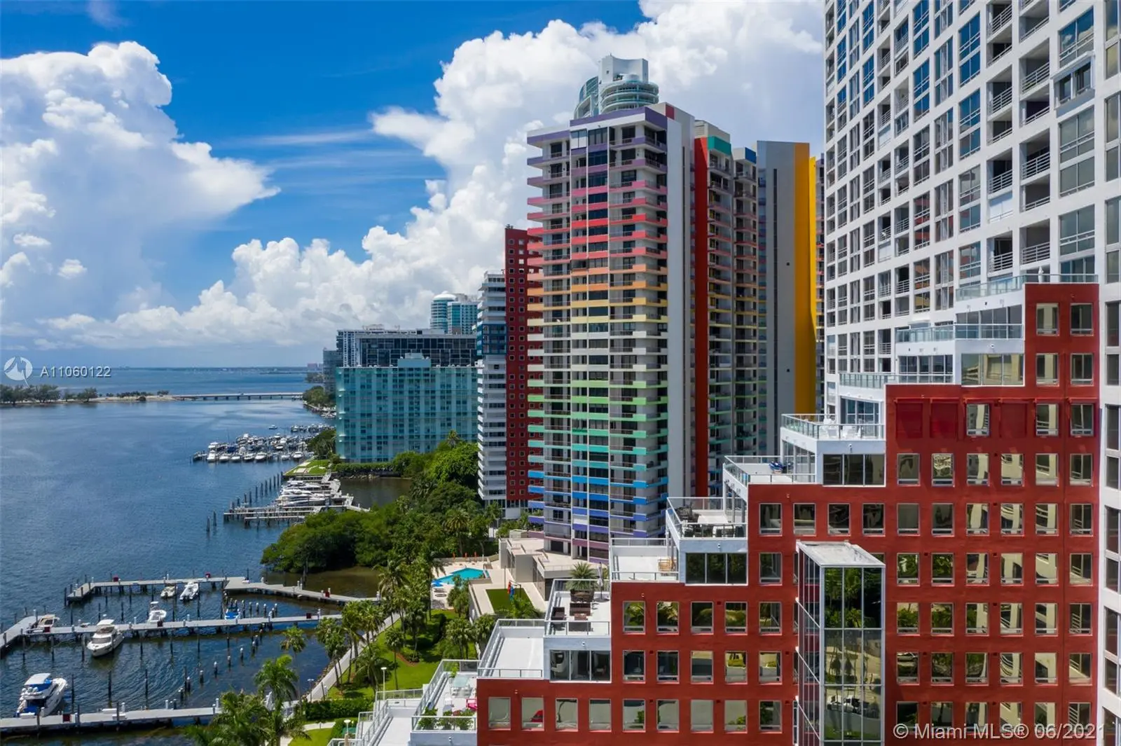 The Palace highlights colorful towers along a scenic Miami waterfront.